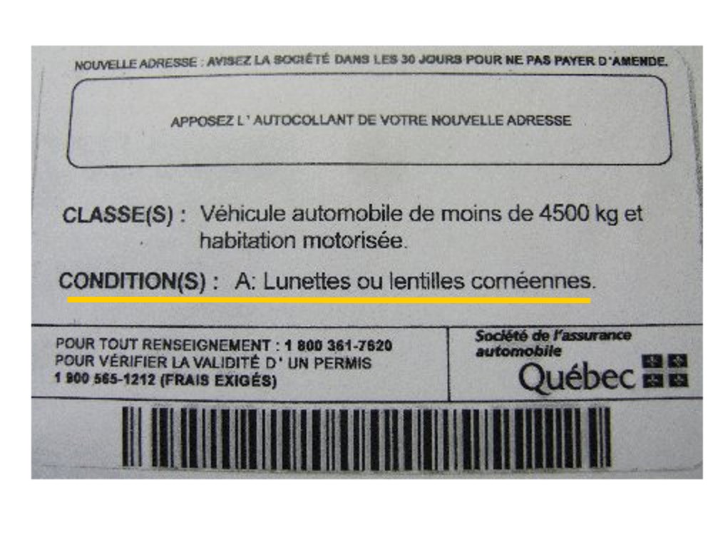 Back of Marie Canadian license showing glasses restriction